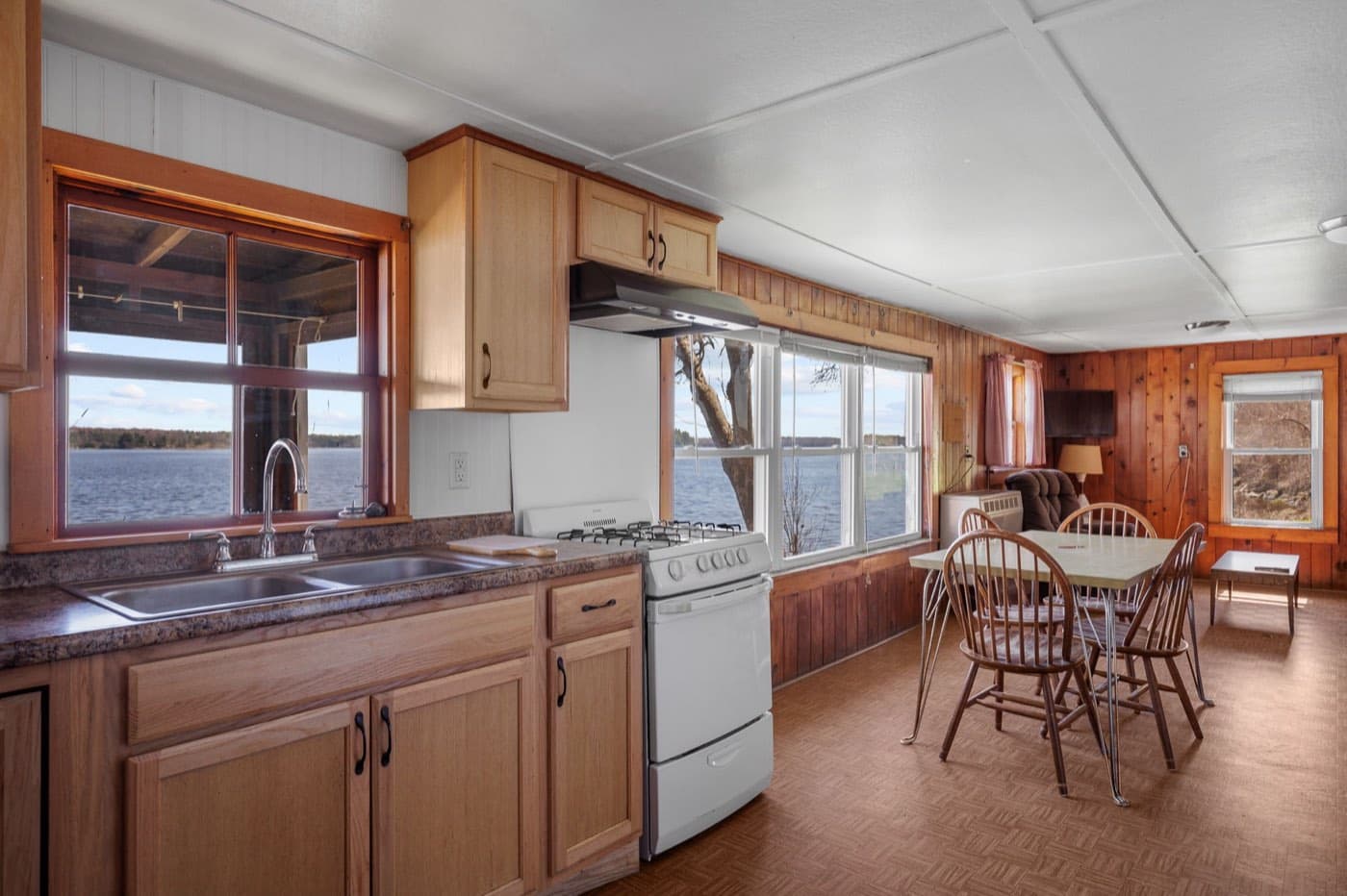 A cottage kitchen with lake views